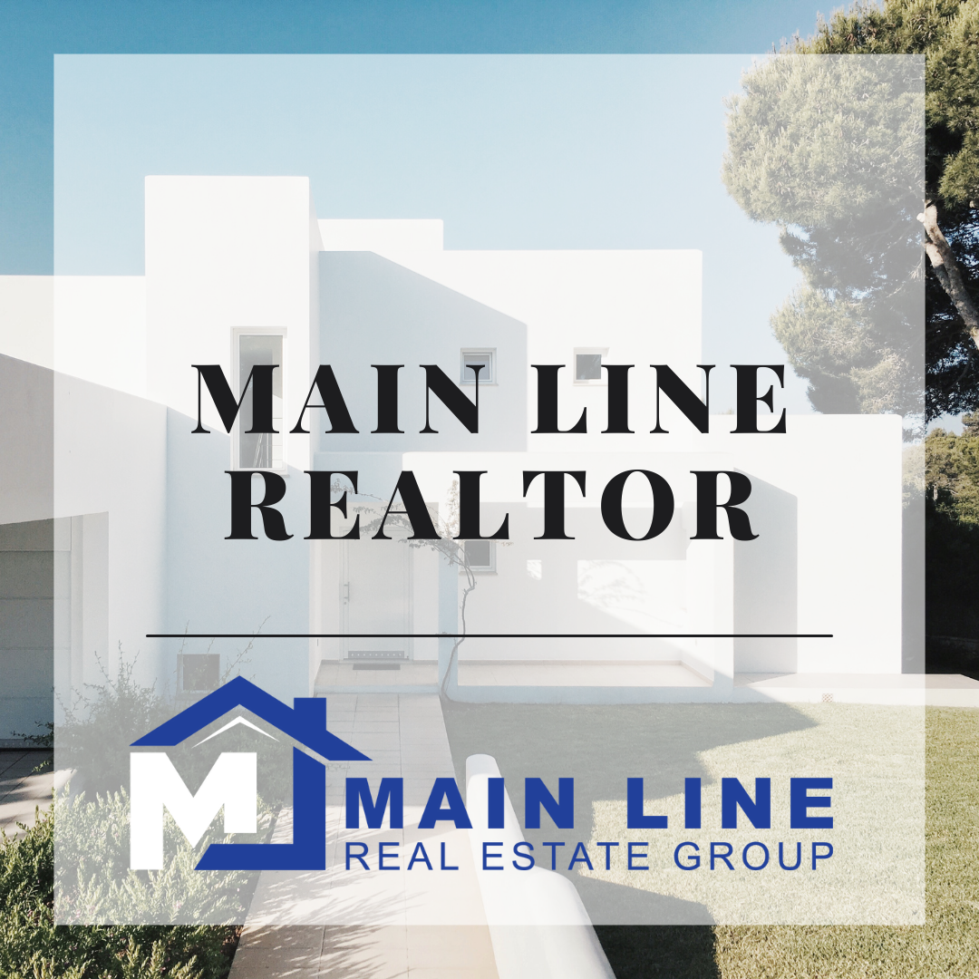 Main Line Realtor with Clients" - Illustrating the expertise of a trusted Main Line Realtor guiding clients through real estate transactions.