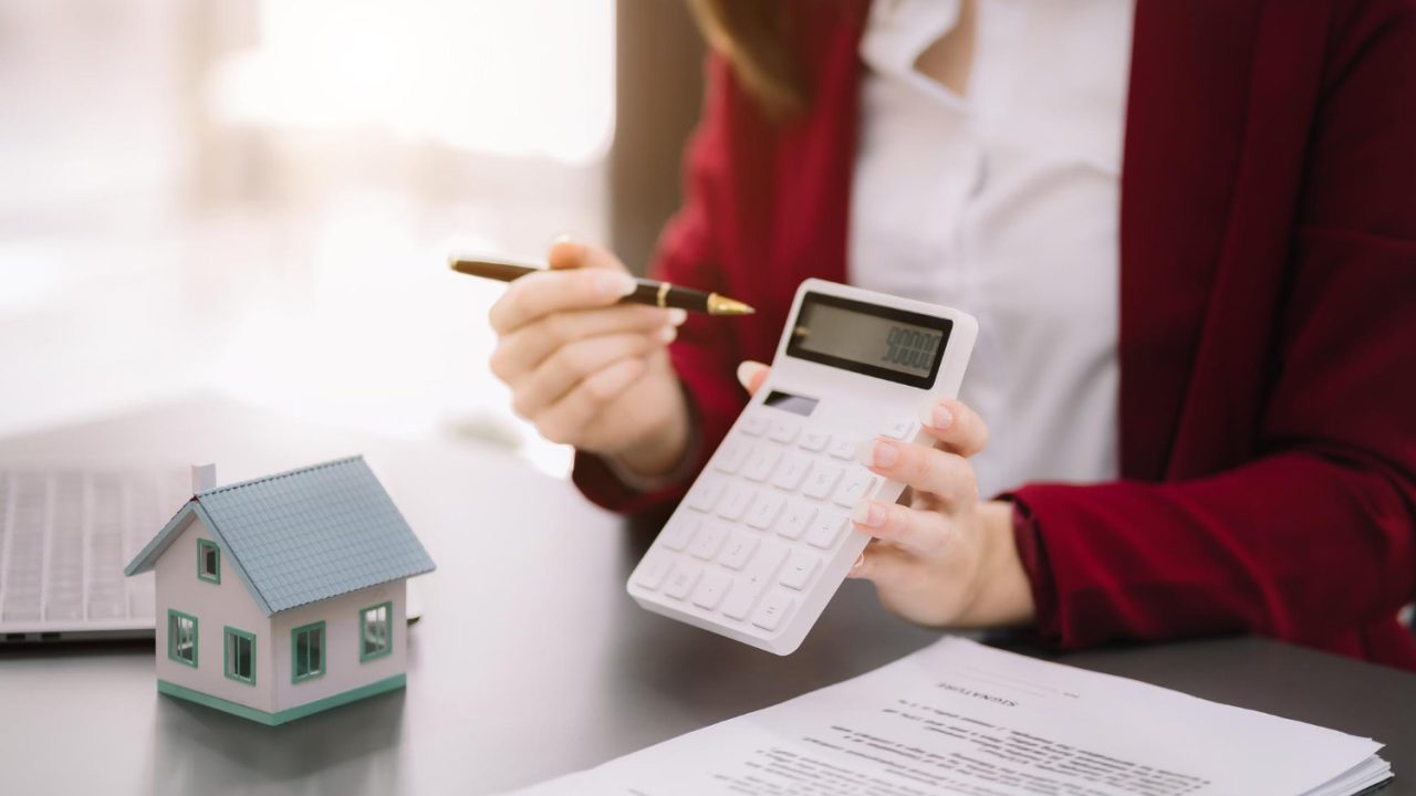 buying-home-insurance-deal-insurance-agent-pointing-pen-those-interested-renting-house-contract-signing-home-buying-agreement-office